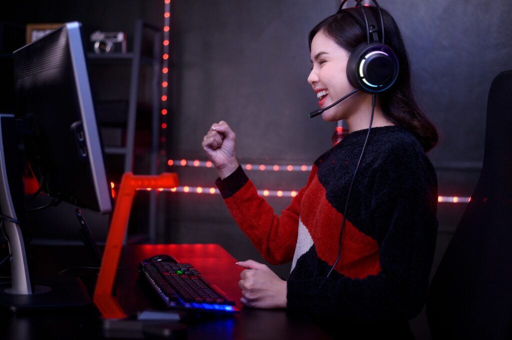 Professional Streamer and gamer with headset playing online video games